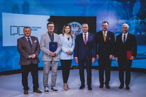 Group photo of the Head of the CBA, the Rector of the Lublin University of Technology and other participants of the meeting.