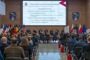 Participants of conference during discussion about asset declaration.