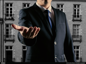 a man reaching out with his hand